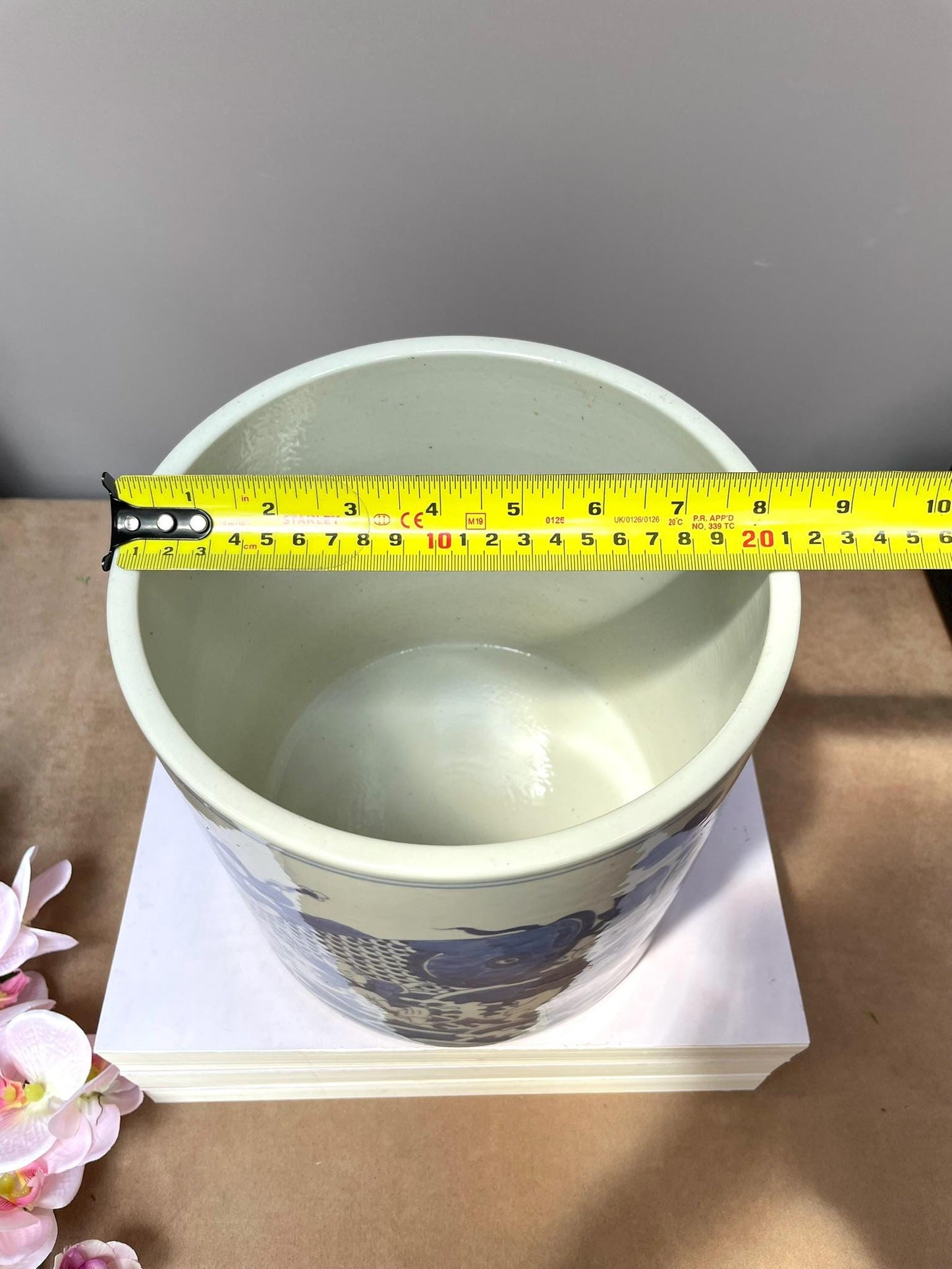 Hand-Painted Chinese Blue and White Porcelain Vase with “Baby Holding Fish” Motif Symbolizing Prosperity and Abundance